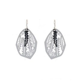 Pair of silver leaf-shaped earrings with intricate cut-out patterns on a white background