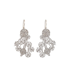 Silver floral earrings on a white background