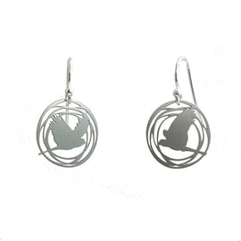 Silver earrings with circular design on a white background