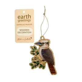 Wooden kookaburra decoration with 'earth greetings' tag on a white background