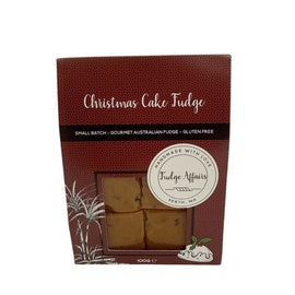 Box of Christmas Cake Fudge with 'Fudge Affairs' branding on a white background