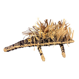 Sculpture of an echidna made from woven natural fibres on a white background