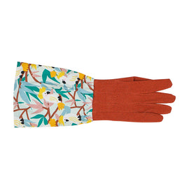 Gloves with colorful floral pattern on one side and rust-colored on the other, on a white background.