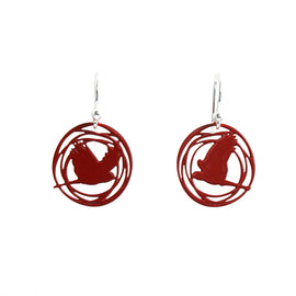 Red circular earrings with a bird design on a white background