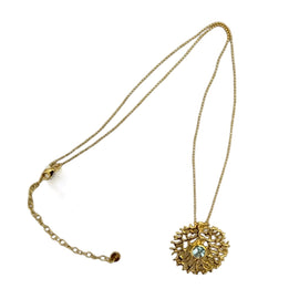 Yellow gold necklace on a white background.