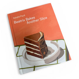 Book titled 'Beatrix Bakes Another Slice' with a cake illustration on an orange background