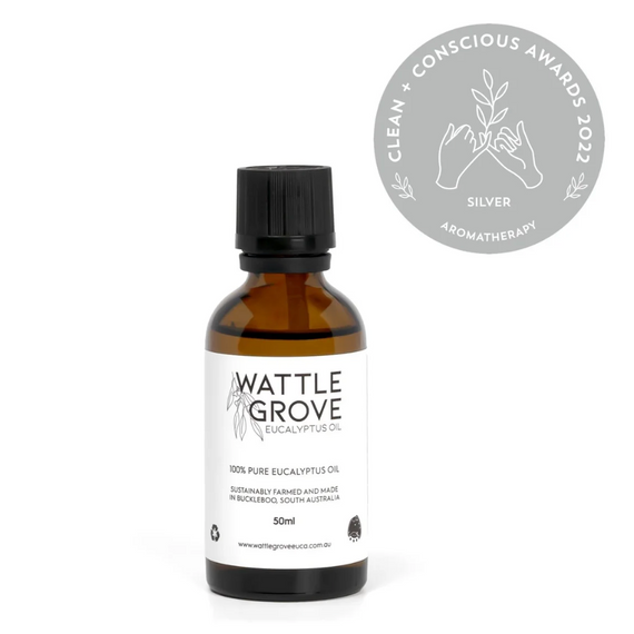 Bottle of Wattle Grove eucalyptus oil with a silver award badge on a white background