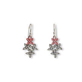 Pair of earrings with pink floral tops and silver leaf-like bottoms on a white background