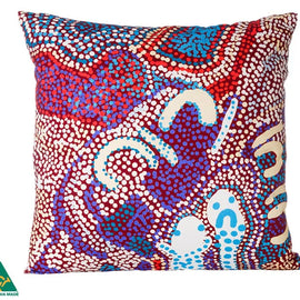 Decorative pillow with a colorful aboriginal art pattern on a white background, featuring the Australian Made logo.