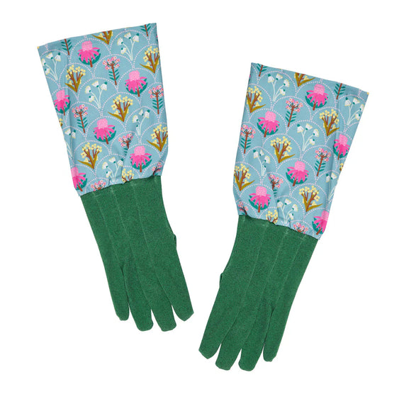 Pair of green gardening gloves with floral pattern on a white background