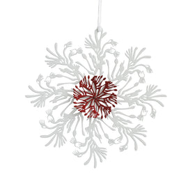 A Christmas ornament featuring a stylized kangaroo paw with a powder-coated finish in red, white, and gold colors, made from raw stainless steel.